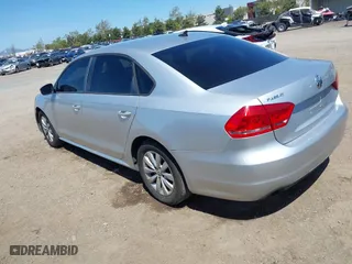 2015 Volkswagen Passat 1.8T Wolfsburg Ed with VIN 1VWAT7A37FC045499, listed as a IAAI auction lot 42020337 with 171,804 mi miles. Bid and sale history available at carsss.com. Image 3.