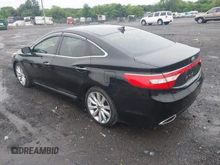 2013 Hyundai Azera z VIN KMHFH4JG5DA328645, wystawiony jako IAAI lot #42531226 z przebiegiem 82 403 mil mil oraz . Historia ofert i sprzedaży dostępna na DreamBid. Obrazek 3.
