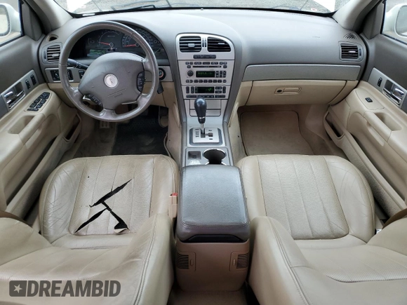 2005 Lincoln LS Sport z VIN 1LNHM87A95Y653578, wystawiony jako Copart lot #76339924 z przebiegiem 97 998 mil mil oraz Szkoda całkowita • Salvage title. Historia ofert i sprzedaży dostępna na DreamBid. Obrazek 8.