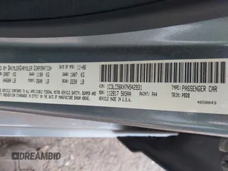 2007 Chrysler Sebring Touring z VIN 1C3LC56KX7N542931, wystawiony jako IAAI lot #42167913 z przebiegiem 240 638 mil mil oraz . Historia ofert i sprzedaży dostępna na DreamBid. Obrazek 9.