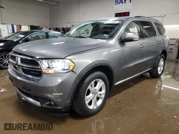 2012 Dodge Durango Crew with VIN 1C4RDJDG1CC100717, listed as a Copart auction lot 47446365 with 103,539 mi miles and Salvage Title. Bid and sale history available at carsss.com. Image 1.