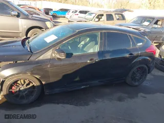 2015 Ford Focus ST with VIN 1FADP3L95FL339181, listed as a IAAI auction lot 41397051 with 124,656 mi miles. Bid and sale history available at carsss.com. Image 15.