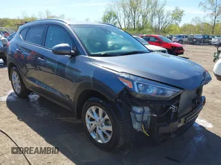 2021 Hyundai Tucson Value z VIN KM8J33A45MU359613, wystawiony jako IAAI lot #42143797 z przebiegiem 65 017 mil mil oraz . Historia ofert i sprzedaży dostępna na DreamBid. Obrazek 1.