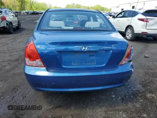 2005 Hyundai Elantra GLS z VIN KMHDN46D15U063723, wystawiony jako Copart lot #56113495 z przebiegiem 115 513 mil mil oraz Szkoda całkowita • Salvage title. Historia ofert i sprzedaży dostępna na DreamBid. Obrazek 6.