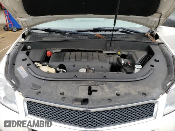2012 Chevrolet Traverse LS z VIN 1GNKRFED7CJ396589, wystawiony jako Copart lot #52630935 z przebiegiem 130 670 mil mil oraz Szkoda całkowita • Salvage title. Historia ofert i sprzedaży dostępna na DreamBid. Obrazek 14.