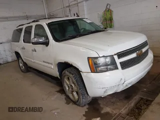 2007 Chevrolet Suburban LT z VIN 1GNFK16387J352797, wystawiony jako IAAI lot #42310897 z przebiegiem 208 836 mil mil oraz . Historia ofert i sprzedaży dostępna na DreamBid. Obrazek 1.