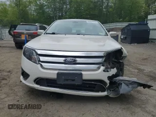 2012 Ford Fusion Hybrid with VIN 3FADP0L34CR414234, listed as a Copart auction lot 58891715 with 147,409 mi miles and Salvage title. Bid and sale history available at DreamBid. Image 5.