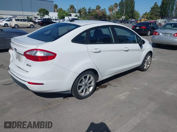 2019 Ford Fiesta SE z VIN 3FADP4BJ6KM143891, wystawiony jako IAAI lot #42244796 z przebiegiem 62 143 mil mil oraz . Historia ofert i sprzedaży dostępna na DreamBid. Obrazek 4.