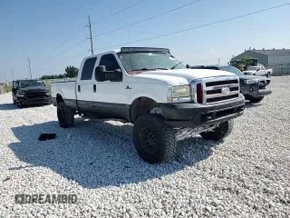 2000 Ford Super Duty F-250 XL with VIN 1FTNW21SXYEA52699, listed as a Copart auction lot 78659054 with 154,056 mi miles and Salvage Title. Bid and sale history available at carsss.com. Image 10.