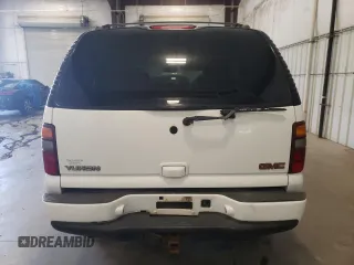 2003 GMC Yukon Denali z VIN 1GKEK63U23J136487, wystawiony jako Copart lot #57974035 z przebiegiem 280 637 mil mil oraz Tytuł czysty. Historia ofert i sprzedaży dostępna na DreamBid. Obrazek 6.