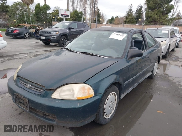 1997 Honda Civic DX with VIN 1HGEJ6128VL023684, listed as a IAAI auction lot 41502999 with 140,871 mi miles. Bid and sale history available at carsss.com. Image 6.
