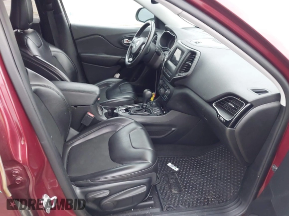 2019 Jeep Cherokee Latitude Plus with VIN 1C4PJMLB1KD319905, listed as a IAAI auction lot 41143311 with 98,694 mi miles. Bid and sale history available at carsss.com. Image 5.