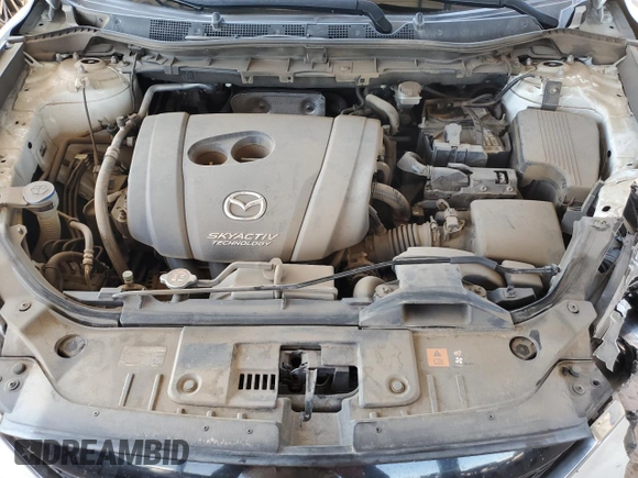 2015 Mazda CX-5 Touring with VIN JM3KE2CY2F0478167, listed as a Copart auction lot 52772805 with 135,492 mi miles and Salvage Title. Bid and sale history available at carsss.com. Image 12.