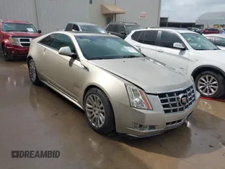 2013 Cadillac CTS Coupe Premium with VIN 1G6DS1E36D0107566, listed as a IAAI auction lot 42079197 with 122,386 mi miles. Bid and sale history available at carsss.com. Image 1.
