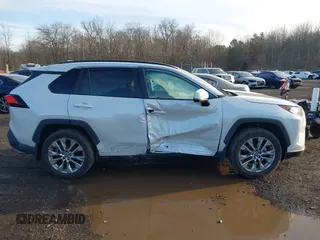 2021 Toyota RAV4 XLE Premium z VIN 2T3A1RFV2MW217009, wystawiony jako IAAI lot #41526066 z przebiegiem 36 619 mil mil oraz . Historia ofert i sprzedaży dostępna na DreamBid. Obrazek 13.