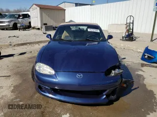 2002 Mazda MX-5 Miata Cloth z VIN JM1NB353820222664, wystawiony jako Copart lot #49701925 z przebiegiem 95 873 mil mil oraz Szkoda całkowita • Salvage title. Historia ofert i sprzedaży dostępna na DreamBid. Obrazek 5.