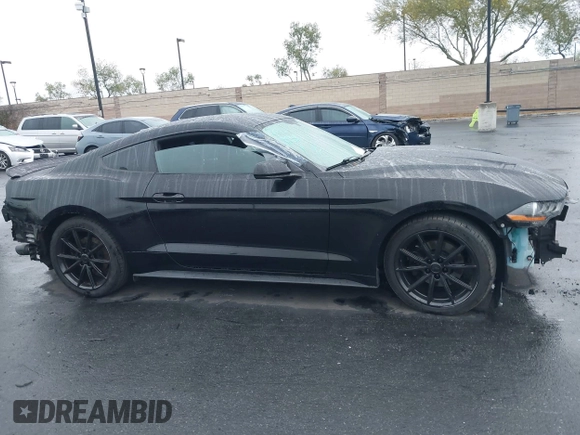 2019 Ford Mustang EcoBoost z VIN 1FA6P8TH2K5143582, wystawiony jako IAAI lot #42172259 z przebiegiem 53 614 mil mil oraz . Historia ofert i sprzedaży dostępna na DreamBid. Obrazek 14.