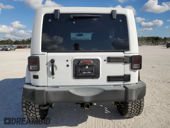 2015 Jeep Wrangler Unlimited Sahara with VIN 1C4BJWEG6FL614671, listed as a Copart auction lot 86052284 with 92,894 mi miles and Salvage title. Bid and sale history available at DreamBid. Image 6.