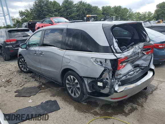 2021 Honda Odyssey EX-L with VIN 5FNRL6H79MB044718, listed as a Copart auction lot 65351134 with 28,888 mi miles and Salvage Title. Bid and sale history available at DreamBid. Image 2.
