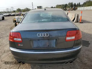 2007 Audi S8 z VIN WAUPN44E97N013501, wystawiony jako Copart lot #74240814 z przebiegiem Nie podano mil oraz Szkoda całkowita • Salvage title. Historia ofert i sprzedaży dostępna na DreamBid. Obrazek 6.