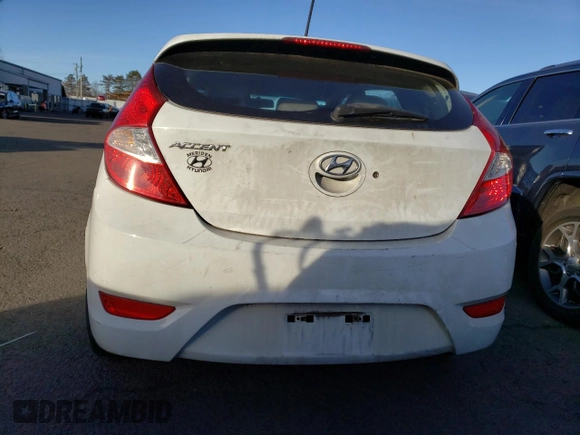 2015 Hyundai Accent Sport with VIN KMHCU5AE2FU217782, listed as a Copart auction lot 41446935 with 99,764 mi miles and Clean Title. Bid and sale history available at carsss.com. Image 6.