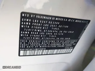 2018 Volkswagen Tiguan S with VIN 3VV1B7AX1JM015870, listed as a IAAI auction lot 41632032 with 82,578 mi miles. Bid and sale history available at carsss.com. Image 9.