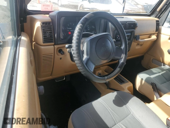 1997 Jeep Wrangler Sahara with VIN 1J4FY49S2VP495910, listed as a Copart auction lot 47794585 with 147,420 mi miles and Salvage Title. Bid and sale history available at carsss.com. Image 8.