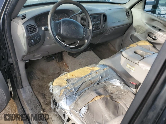 1997 Ford F-150 z VIN 1FTDX08W4VKD75892, wystawiony jako Copart lot #85554054 z przebiegiem 280 706 mil mil oraz Czysty tytuł • Clean title. Historia ofert i sprzedaży dostępna na DreamBid. Obrazek 8.