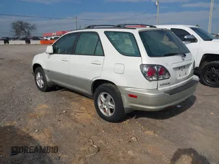 2003 Lexus RX 300 z VIN JTJGF10U730154745, wystawiony jako IAAI lot #41915670 z przebiegiem 174 314 mil mil oraz . Historia ofert i sprzedaży dostępna na DreamBid. Obrazek 3.