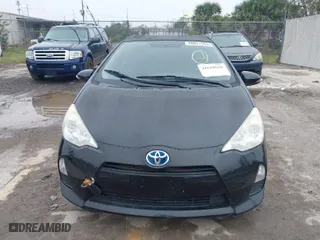 2014 Toyota Prius c One with VIN JTDKDTB36E1569720, listed as a IAAI auction lot 41618620 with 1 mi miles. Bid and sale history available at carsss.com. Image 13.