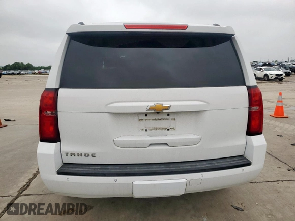 2015 Chevrolet Tahoe LT with VIN 1GNSCBKC0FR210211, listed as a Copart auction lot 55496995 with 128,296 mi miles and Salvage title. Bid and sale history available at DreamBid. Image 6.