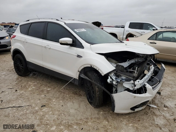 2015 Ford Escape Titanium with VIN 1FMCU0JX4FUC12264, listed as a Copart auction lot 45060775 with 130,195 mi miles and Clean Title. Bid and sale history available at carsss.com. Image 4.
