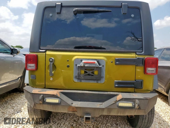 2007 Jeep Wrangler Unlimited X with VIN 1J4GB39197L207883, listed as a Copart auction lot 58778195 with 173,262 mi miles and Salvage title. Bid and sale history available at DreamBid. Image 6.