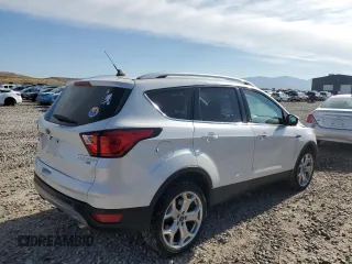 2019 Ford Escape Titanium с VIN 1FMCU9J91KUA35320, выставлен на аукционе Copart как лот 57755525 с пробегом 70 838 миль миль и На запчасти • Non repairable. История ставок и продаж доступна на DreamBid. Изображение 3.