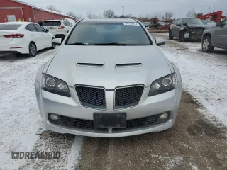 2009 Pontiac G8 z VIN 6G2ER57729L223218, wystawiony jako Copart lot #84234214 z przebiegiem 222 165 mil mil oraz Szkoda całkowita • Salvage title. Historia ofert i sprzedaży dostępna na DreamBid. Obrazek 5.