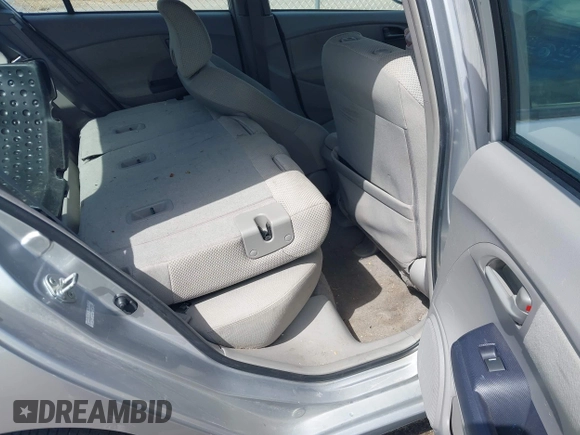 2010 Honda Insight EX with VIN JHMZE2H71AS017996, listed as a IAAI auction lot 42091356 with 142,474 mi miles and . Bid and sale history available at DreamBid. Image 8.