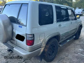 2001 Isuzu Trooper S z VIN JACDJ58X417J03071, wystawiony jako Copart lot #77033444 z przebiegiem 151 982 mil mil oraz Szkody całkowita. Historia ofert i sprzedaży dostępna na DreamBid. Obrazek 4.