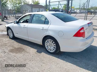 2012 Ford Fusion Hybrid with VIN 3FADP0L38CR255511, listed as a IAAI auction lot 42381063 with 82,083 mi miles and . Bid and sale history available at DreamBid. Image 3.