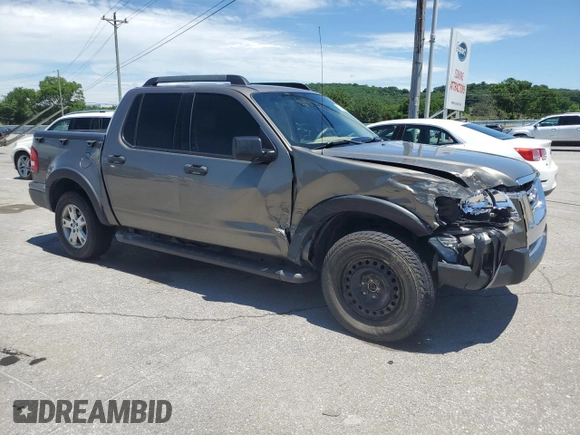 2007 Ford Explorer Sport Trac XLT z VIN 1FMEU51K87UA28537, wystawiony jako Copart lot #57344815 z przebiegiem 155 858 mil mil oraz Szkoda całkowita • Salvage title. Historia ofert i sprzedaży dostępna na DreamBid. Obrazek 4.
