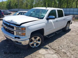 2014 Chevrolet Silverado 1500 LTZ with VIN 3GCUKSECXEG446055, listed as a IAAI auction lot 41988435 with 165,833 mi miles and . Bid and sale history available at DreamBid. Image 2.