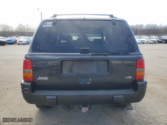 1998 Jeep Grand Cherokee Limited with VIN 1J4GZ78Y0WC140588, listed as a Copart auction lot 49522445 with 62,195 mi miles and Salvage Title. Bid and sale history available at carsss.com. Image 6.