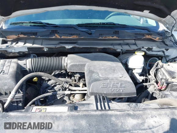 2018 Ram 1500 Tradesman with VIN 1C6RR6FG6JS347673, listed as a IAAI auction lot 41692169 with 121,631 mi miles and . Bid and sale history available at DreamBid. Image 10.