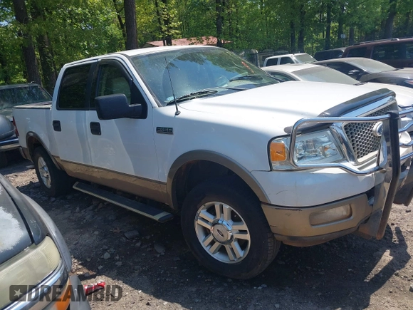 2004 Ford F-150 XLT with VIN 1FTPW12504KC34452, listed as a IAAI auction lot 42051599 with 215,857 mi miles. Bid and sale history available at carsss.com. Image 1.