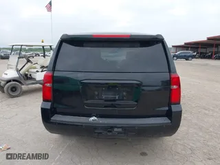 2019 Chevrolet Tahoe Commercial with VIN 1GNLCDECXKR231072, listed as a IAAI auction lot 41800007 with 100,101 mi miles. Bid and sale history available at carsss.com. Image 16.