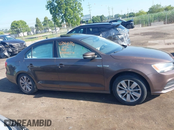 2015 Volkswagen Jetta Sport z VIN 3VWD17AJ5FM411217, wystawiony jako IAAI lot #42563776 z przebiegiem 84 520 mil mil oraz . Historia ofert i sprzedaży dostępna na DreamBid. Obrazek 13.