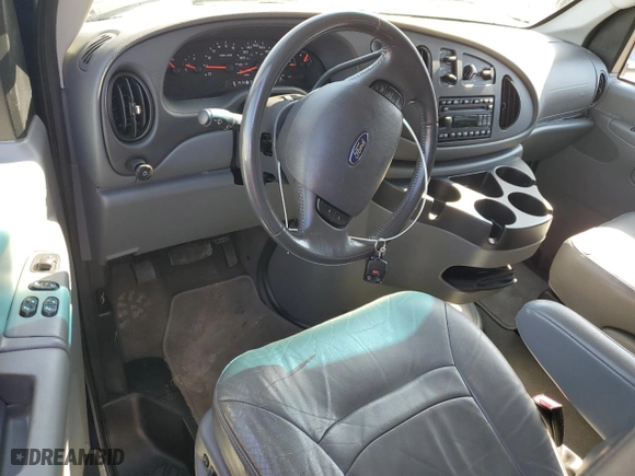 2008 Ford Econoline Wagon XL with VIN 1FMNE11L48DA51670, listed as a Copart auction lot 77653154 with 124,127 mi miles and Salvage Title. Bid and sale history available at carsss.com. Image 8.