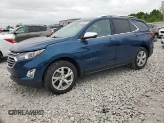 2021 Chevrolet Equinox Premier z VIN 2GNAXXEV3M6109781, wystawiony jako Copart lot #57388135 z przebiegiem 53 458 mil mil oraz Szkoda całkowita • Salvage title. Historia ofert i sprzedaży dostępna na DreamBid. Obrazek 1.