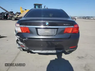 2011 BMW 7 Series 740i with VIN WBAKA4C57BC612487, listed as a Copart auction lot 82633554 with 0 mi miles and Salvage Title. Bid and sale history available at carsss.com. Image 6.