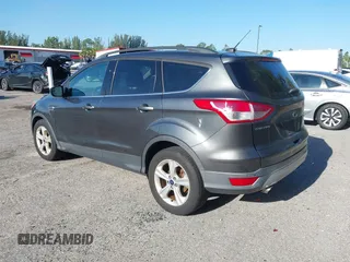2016 Ford Escape SE with VIN 1FMCU9GX3GUB78749, listed as a IAAI auction lot 42030262 with 93,365 mi miles. Bid and sale history available at carsss.com. Image 3.