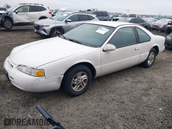 1996 Ford Thunderbird LX z VIN 1FALP6246TH160357, wystawiony jako IAAI lot #41442234 z przebiegiem 99 815 mil mil oraz . Historia ofert i sprzedaży dostępna na DreamBid. Obrazek 2.
